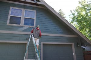 Campbells Custom Finishes Pressure washing a house in Bend Oregon